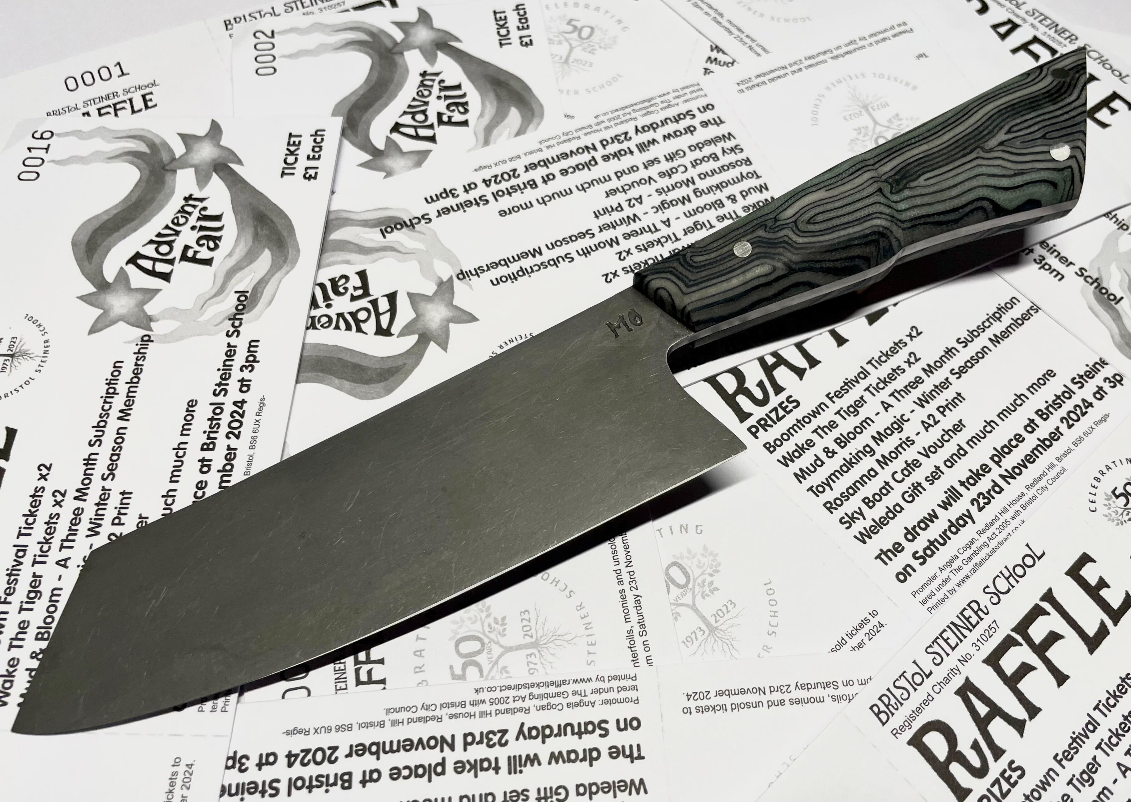 K-tip chef knife on raffle flyers