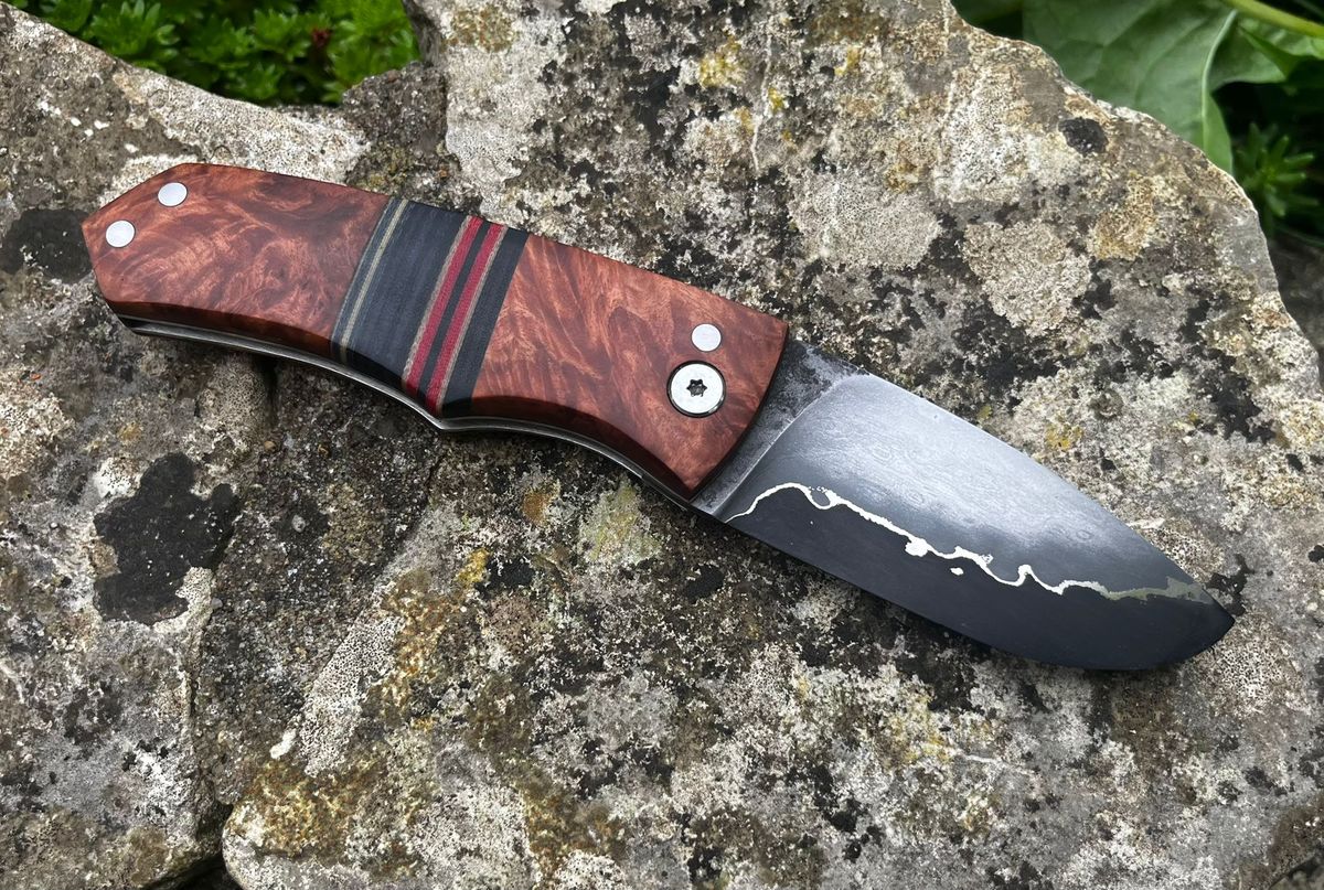 Sunfish friction folder open from the reverse side